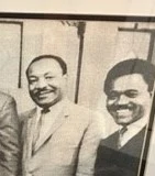 Supplied archival photograph labeled JT with Dr. King
