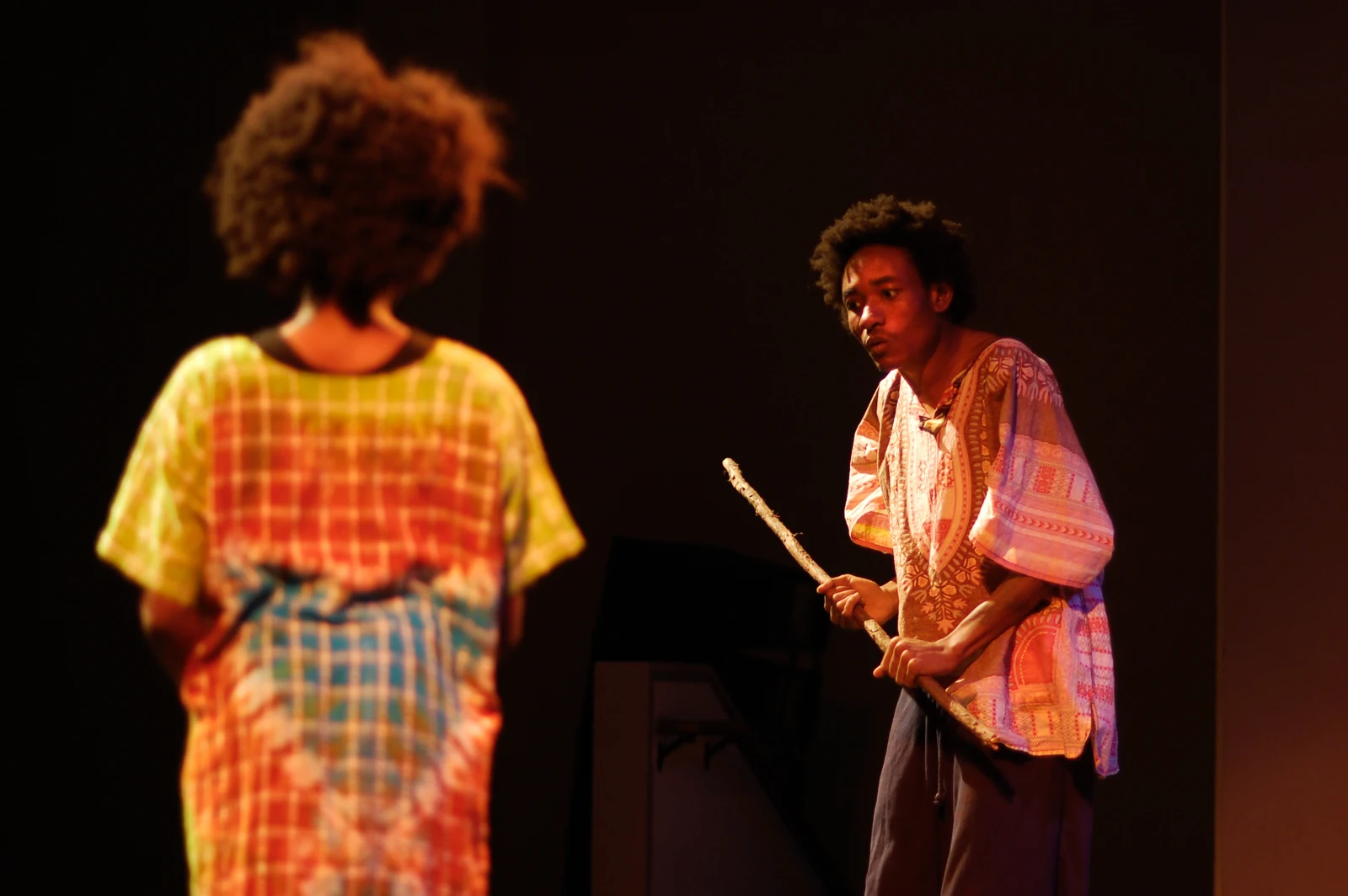 Actors performing The Strong Breed on stage